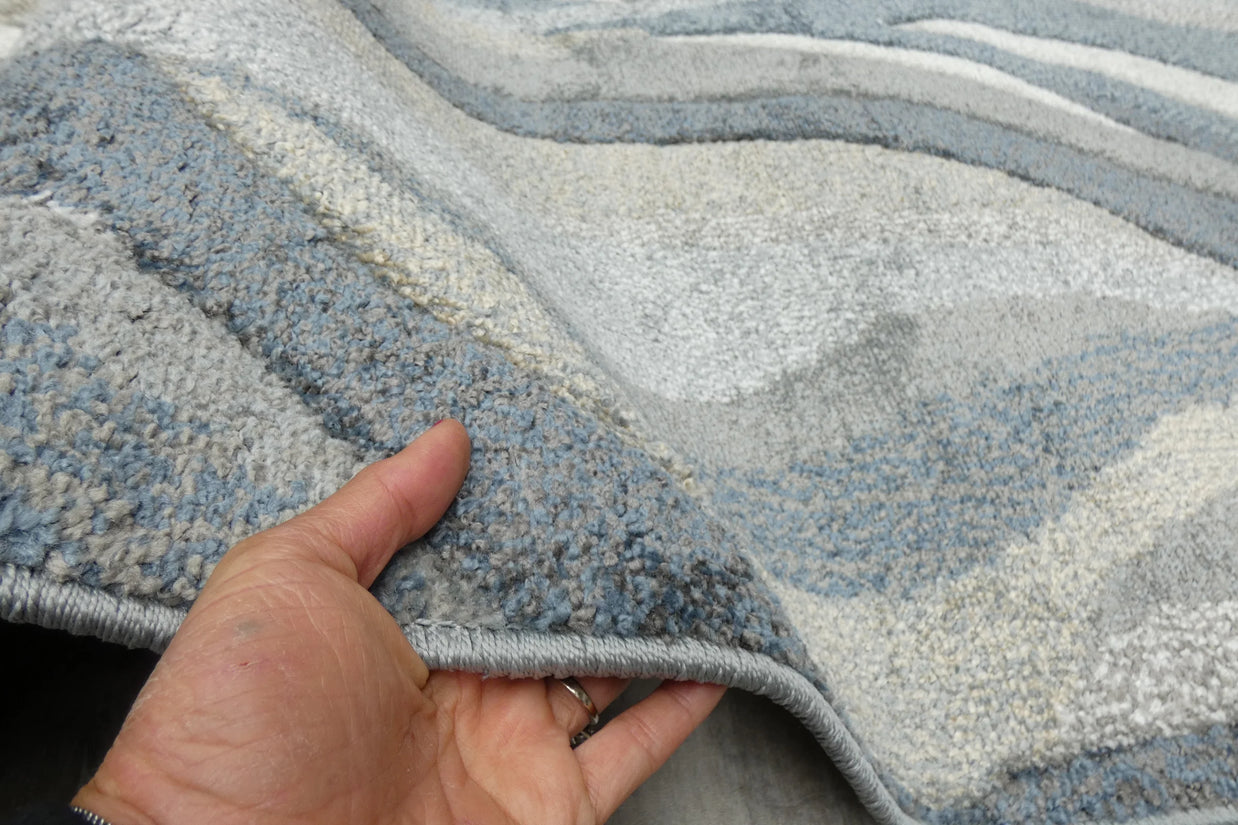 Kimya Collection Abstract Wave Rug in Navy and Neutral Tones – Fluid Contemporary Design
